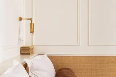 Un ou plusieurs lits dans un hébergement de l'établissement Hôtel Maison Traversière