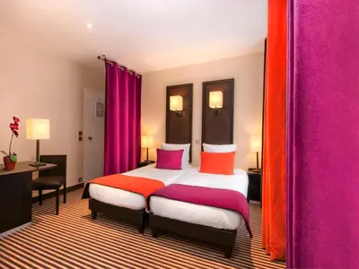 Un ou plusieurs lits dans un hébergement de l'établissement Hotel Pax Opera