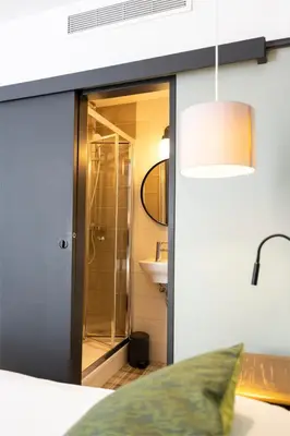 Salle de bains dans l'établissement Hotel SUB