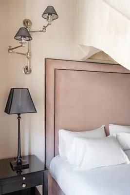 Un ou plusieurs lits dans un hébergement de l'établissement Hôtel Le Presbytère