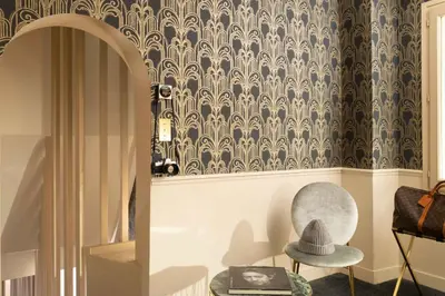 Coin salon dans l'établissement Hôtel Léna