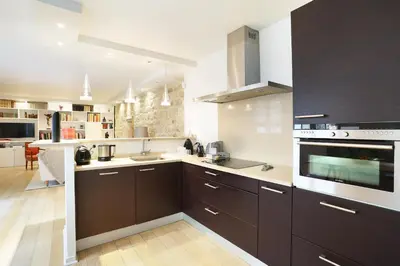 Cuisine ou kitchenette dans l'établissement Apartment Champs Elysées by Studio prestige