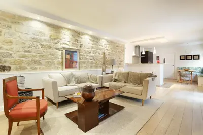 Coin salon dans l'établissement Apartment Champs Elysées by Studio prestige
