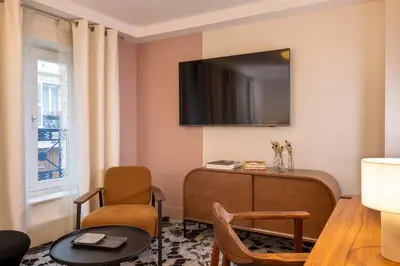 Télévision ou salle de divertissement dans l'établissement Hotel Chavanel