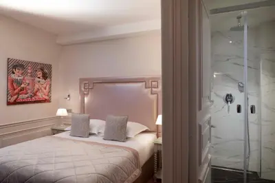 Un ou plusieurs lits dans un hébergement de l'établissement Hotel & Spa Saint-Jacques