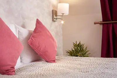 Un ou plusieurs lits dans un hébergement de l'établissement Hôtel Villa Sorel - Paris Boulogne