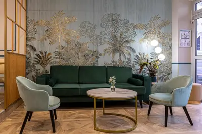 Coin salon dans l'établissement Splendid Hôtel