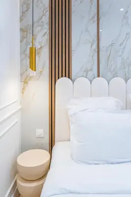 Un ou plusieurs lits dans un hébergement de l'établissement Garbo Hôtel