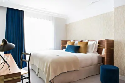 Un ou plusieurs lits dans un hébergement de l'établissement Hotel Parister Piscine & Spa