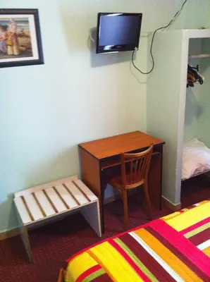 Un ou plusieurs lits dans un hébergement de l'établissement Hotel Pacific