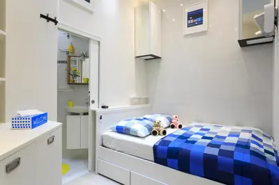 Un ou plusieurs lits dans un hébergement de l'établissement Louvre Luxury Apartment & SPA