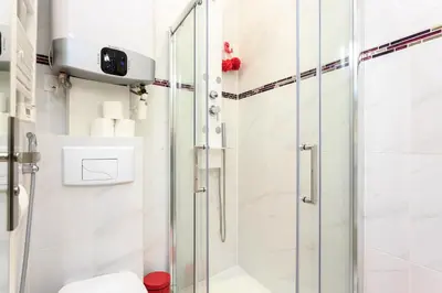 Salle de bains dans l'établissement Louvre Luxury Apartment & SPA