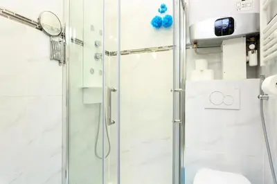Salle de bains dans l'établissement Louvre Luxury Apartment & SPA