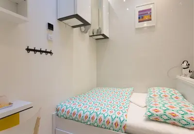 Un ou plusieurs lits dans un hébergement de l'établissement Louvre Luxury Apartment & SPA
