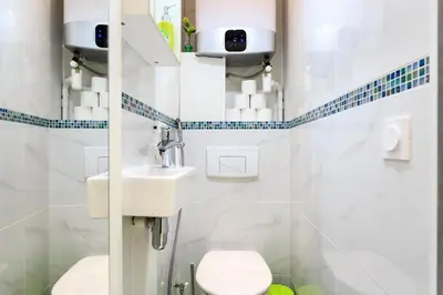 Salle de bains dans l'établissement Louvre Luxury Apartment & SPA
