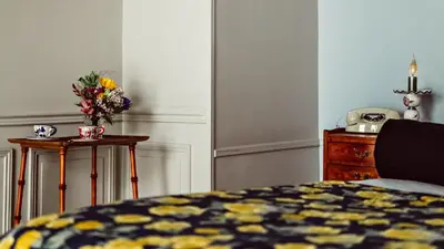 Un ou plusieurs lits dans un hébergement de l'établissement Maison Saintonge