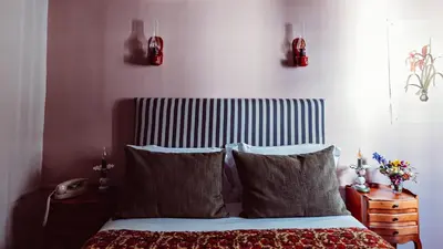 Un ou plusieurs lits dans un hébergement de l'établissement Maison Saintonge