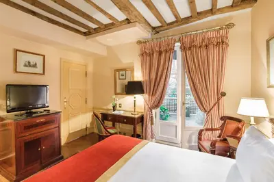Télévision ou salle de divertissement dans l'établissement Hotel Luxembourg Parc