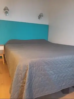 Un ou plusieurs lits dans un hébergement de l'établissement Hôtel de Lorraine