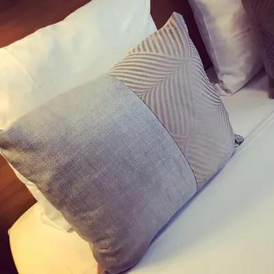 Un ou plusieurs lits dans un hébergement de l'établissement Hotel Corona -Rodier-