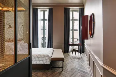 Un ou plusieurs lits dans un hébergement de l'établissement The Hoxton, Paris