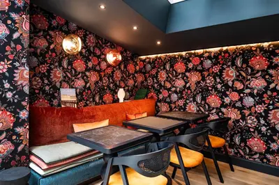 Coin salon dans l'établissement Hôtel Hiro Paris