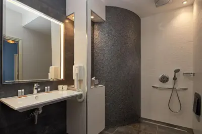 Salle de bains dans l'établissement Grand Hôtel Malher