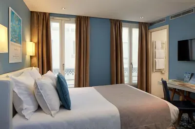 Un ou plusieurs lits dans un hébergement de l'établissement Grand Hôtel Malher