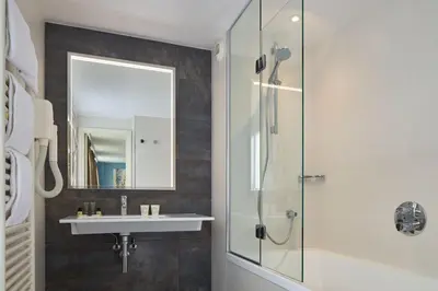 Salle de bains dans l'établissement Grand Hôtel Malher