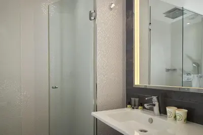 Salle de bains dans l'établissement Grand Hôtel Malher