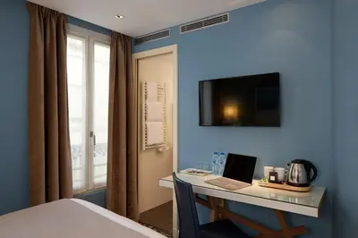 Un ou plusieurs lits dans un hébergement de l'établissement Grand Hôtel Malher