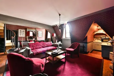 Coin salon dans l'établissement Parc Royal Appartements