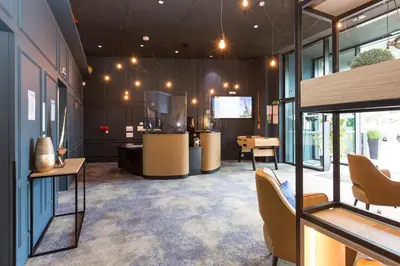 Télévision ou salle de divertissement dans l'établissement Appart'hôtel Odalys City - Paris XVII