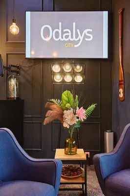 Coin salon dans l'établissement Appart'hôtel Odalys City - Paris XVII