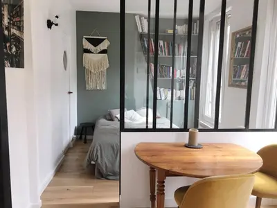 Coin salon dans l'établissement Appartement type loft