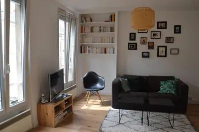 Coin salon dans l'établissement Appartement type loft