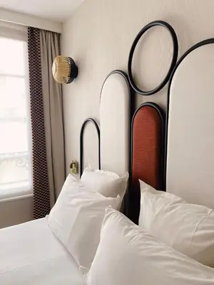 Un ou plusieurs lits dans un hébergement de l'établissement Hôtel de L'Esperance