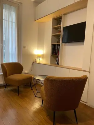 Télévision ou salle de divertissement dans l'établissement Studio Paris tour Eiffel