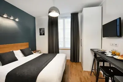 Un ou plusieurs lits dans un hébergement de l'établissement Hotel Résidence Montebello