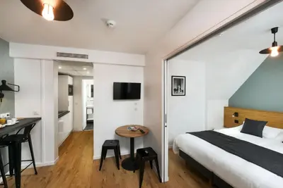 Télévision ou salle de divertissement dans l'établissement Hotel Résidence Montebello