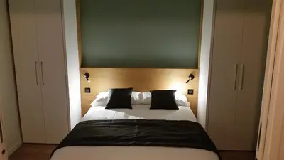 Un ou plusieurs lits dans un hébergement de l'établissement Hotel Résidence Montebello