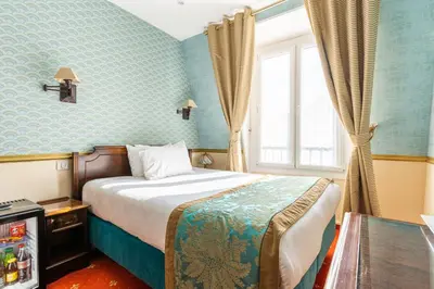 Un ou plusieurs lits dans un hébergement de l'établissement Hôtel Belfast