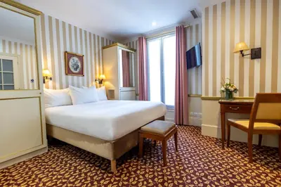 Un ou plusieurs lits dans un hébergement de l'établissement Hôtel Belfast