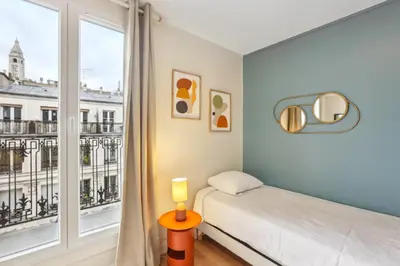 Un ou plusieurs lits dans un hébergement de l'établissement Hôtel Juliette