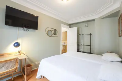 Un ou plusieurs lits dans un hébergement de l'établissement Hôtel Juliette