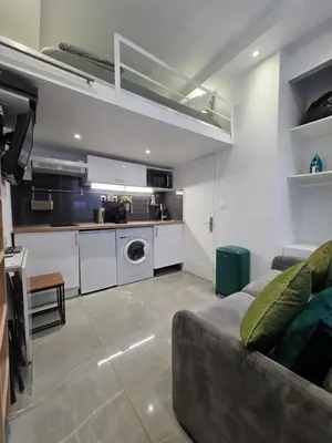 Cuisine ou kitchenette dans l'établissement Studio cosy avec mezzanine