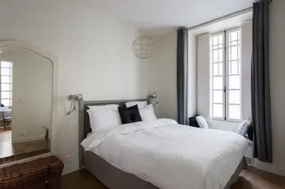 Un ou plusieurs lits dans un hébergement de l'établissement Charming Appartment in Le Marais