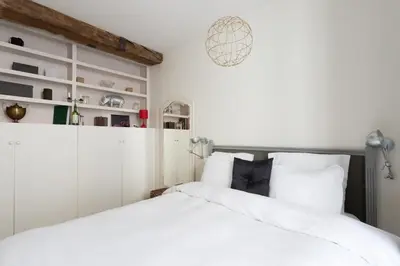 Un ou plusieurs lits dans un hébergement de l'établissement Charming Appartment in Le Marais
