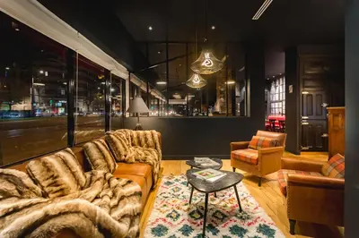 Coin salon dans l'établissement Hôtel Clarisse