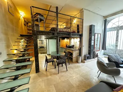 Coin salon dans l'établissement Veda - Loft In The Heart Of Paris - Louvre